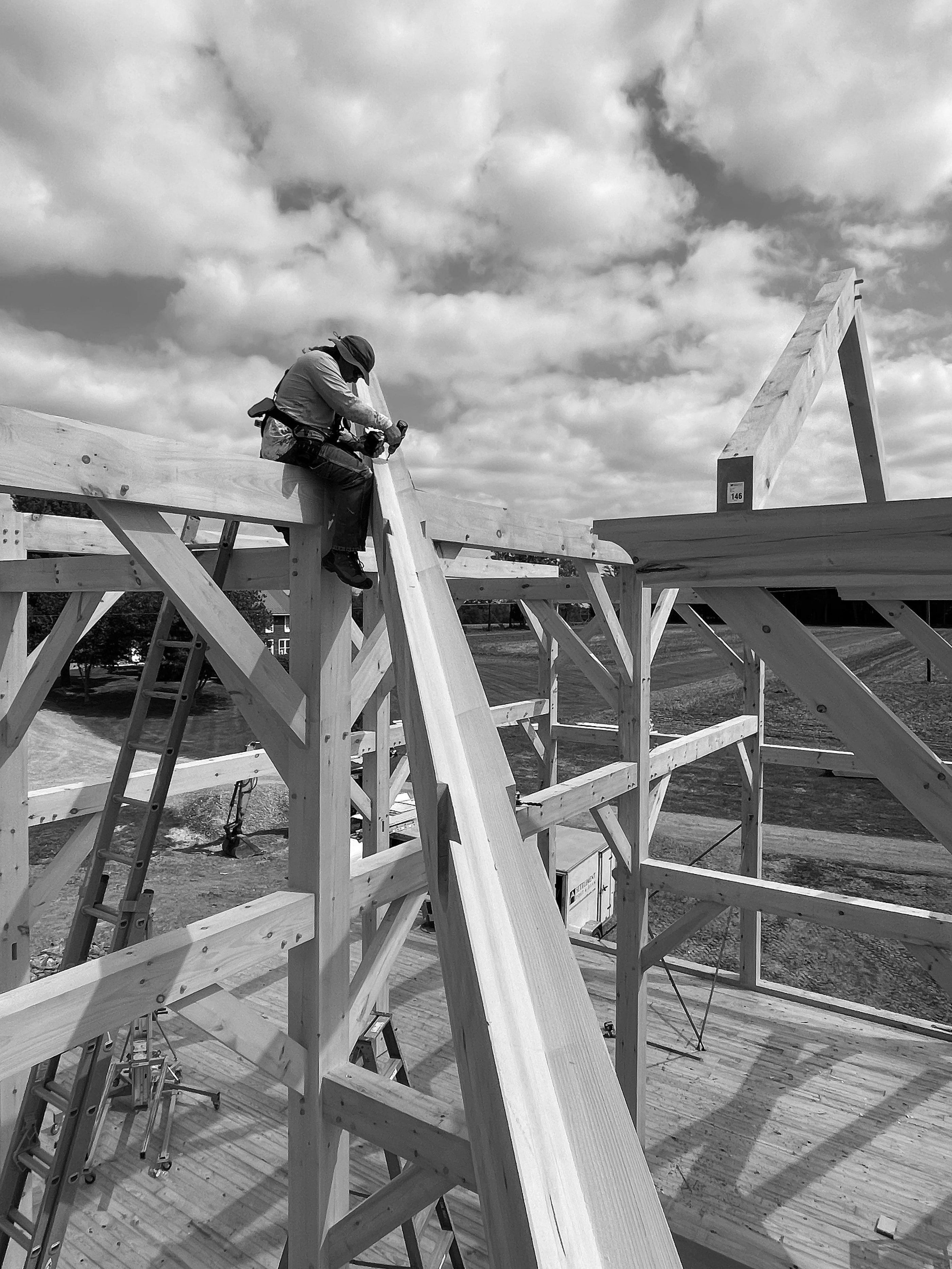 Kayle at the ridge, locking in a valley rafter, Kacin barn