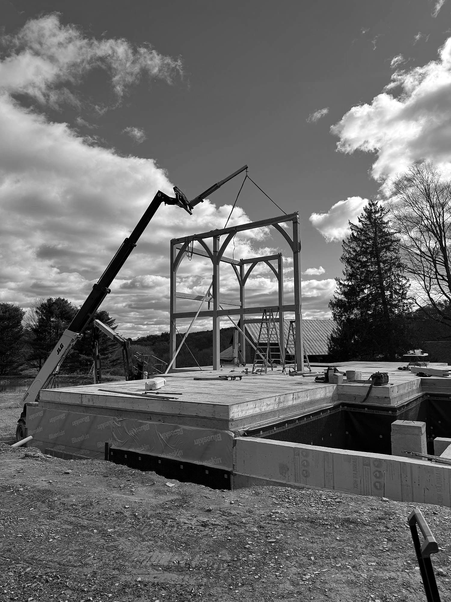 The first bent lifted into place with a telehandler, Mendenhall Hill
