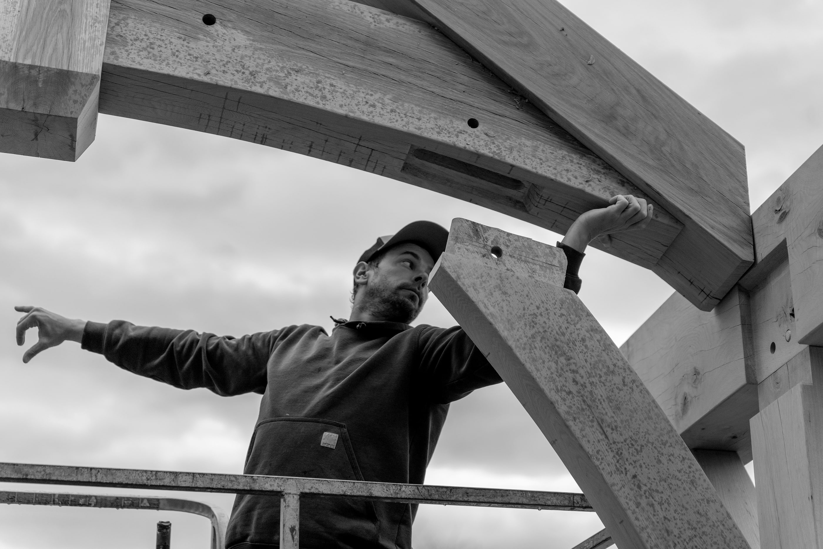 Guiding an arched chord onto its post from a lift, Mendenhall Hill
