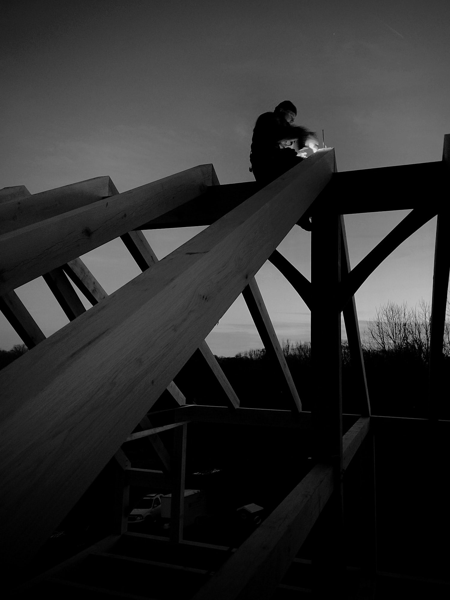 The last pegs at dusk, by headlamp, up on the ridge